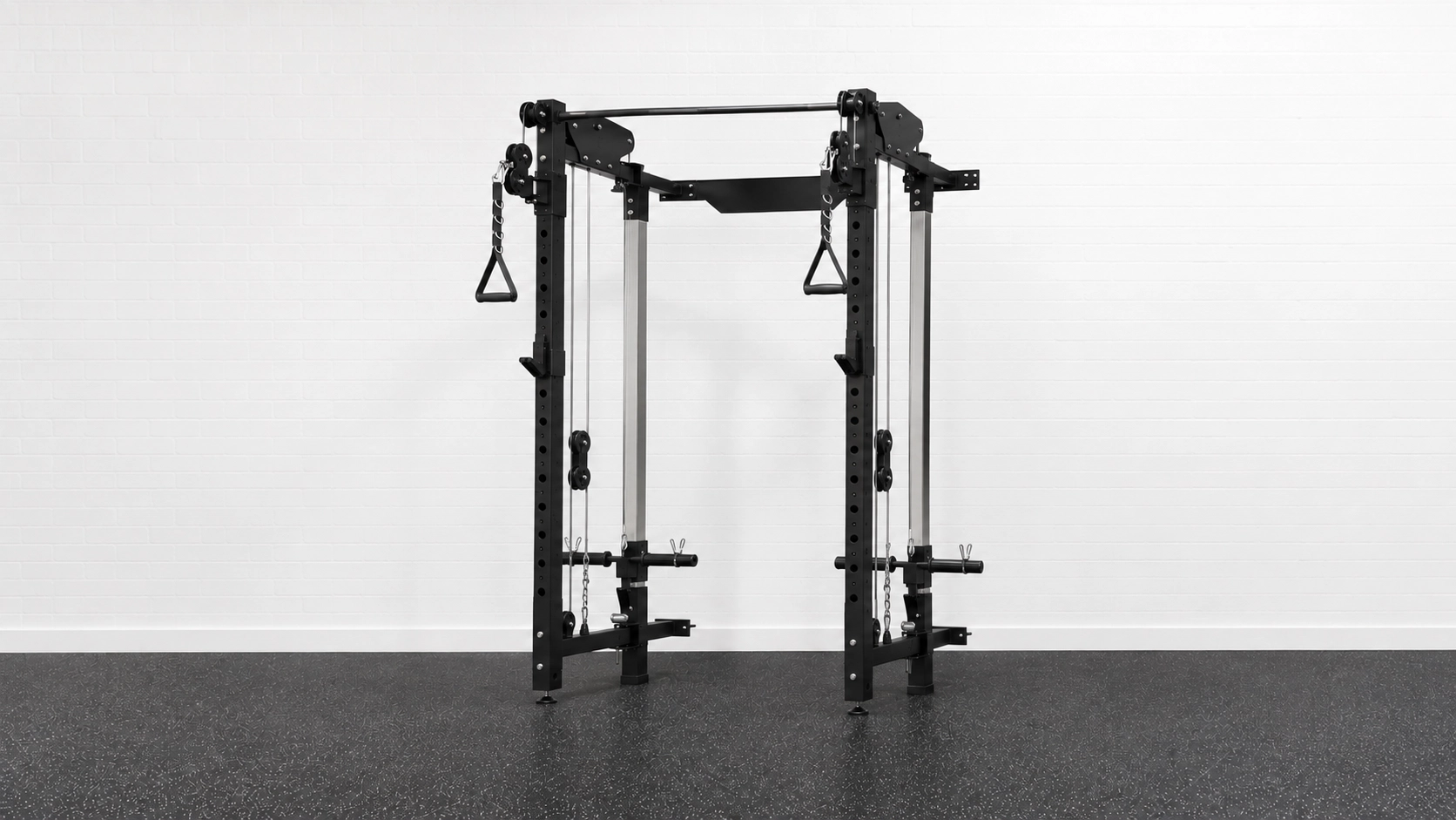Tall power rack with cable pulley system and handles against white brick wall