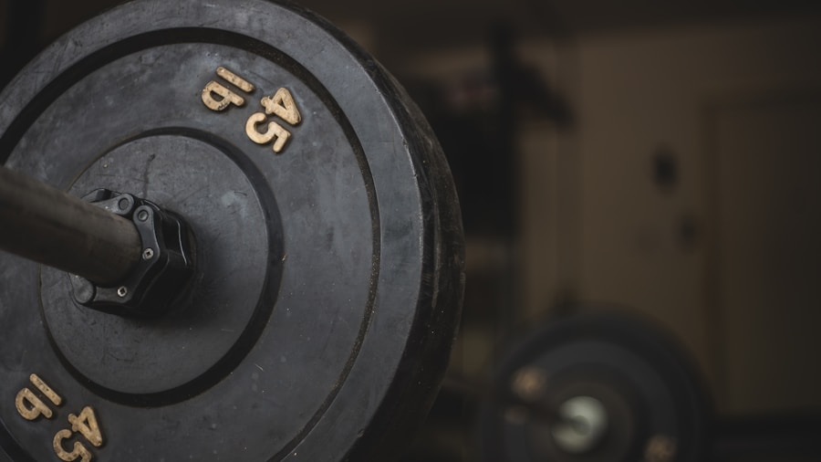 athlete squatting with heavy barbell on smith machine in hom Athlete squatting with heavy barbell on Smith machine in home gym setup