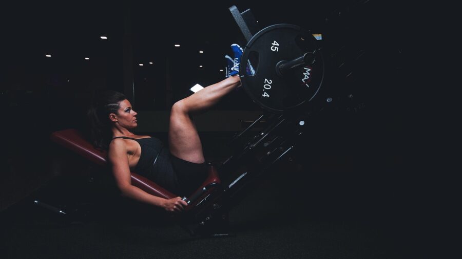 Person consuming carbohydrates before cardio exercise for energy and performance