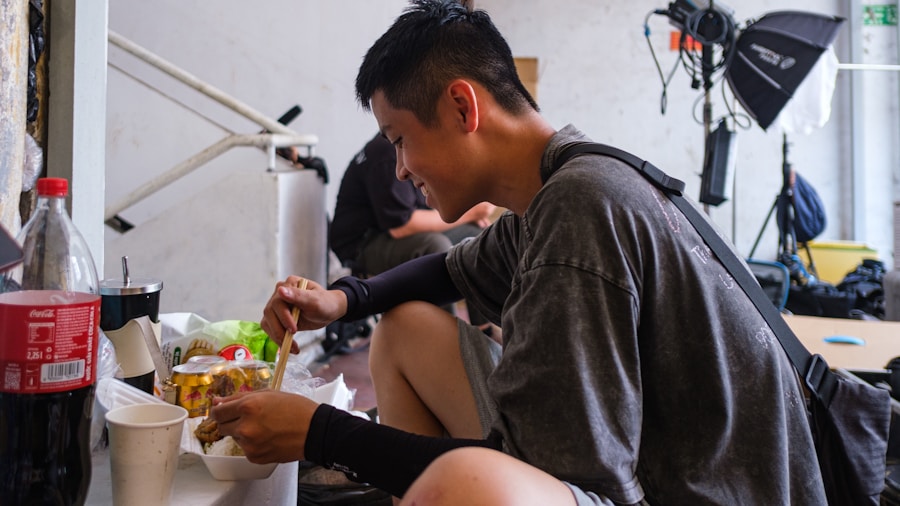 Person eating nutritious meal with protein and vegetables as part of daily calorie intake