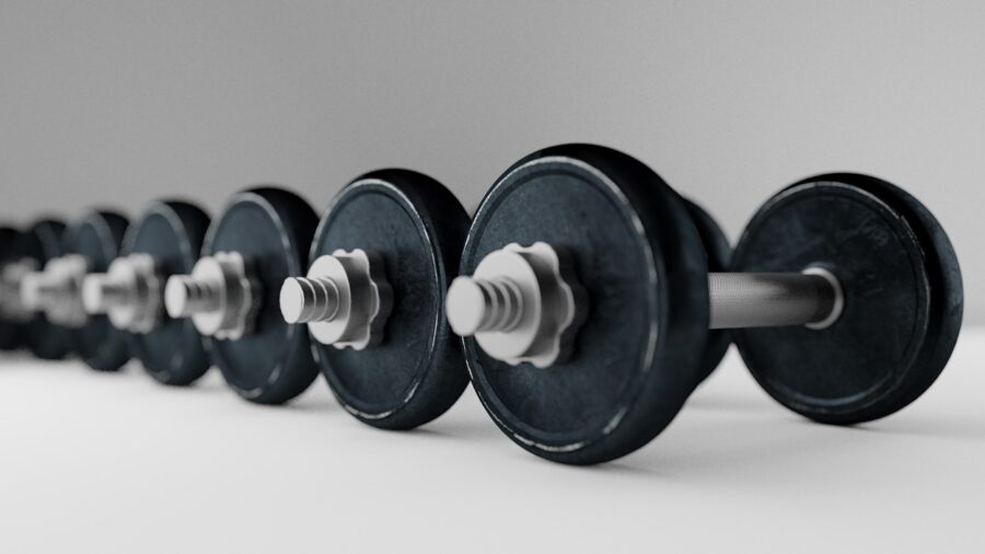 Person performing barbell lift in home gym during quick 30-minute workout session