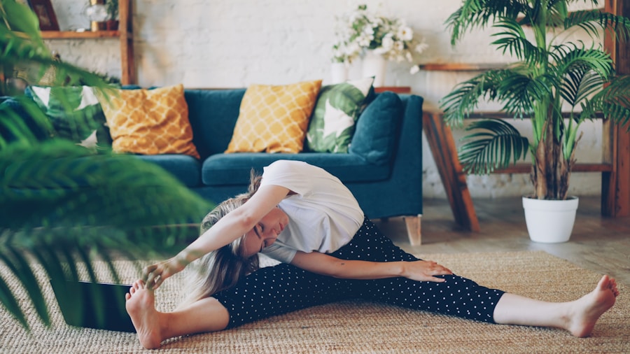 Person performing cool-down stretches after elliptical machine workout in home gym