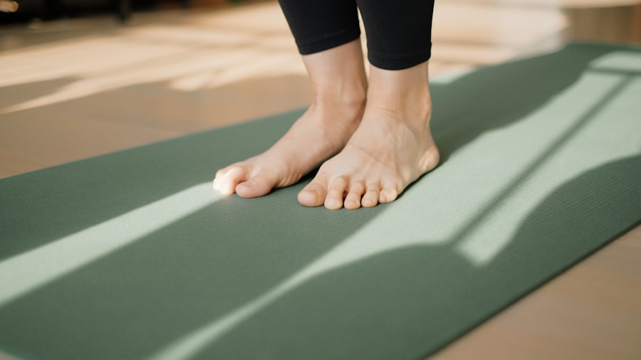 Person performing hip stretch on mat at home for post-workout recovery