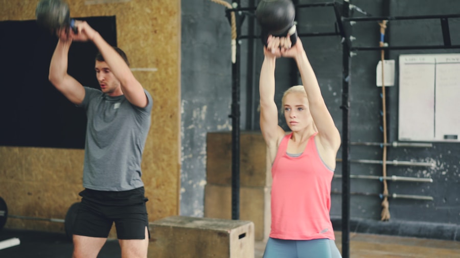 Person performing kettlebell swing with proper hip hinge form during strength and cardio workout