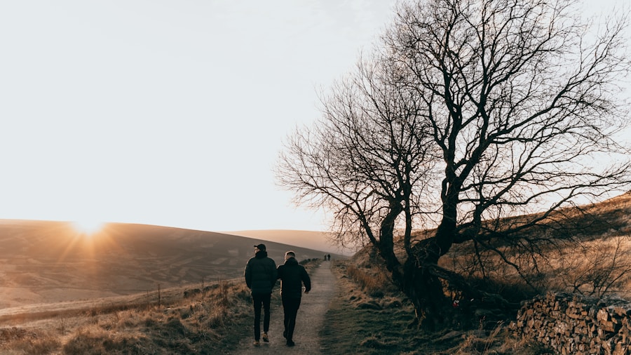 Person walking outdoors at a comfortable pace for post-workout recovery and active rest